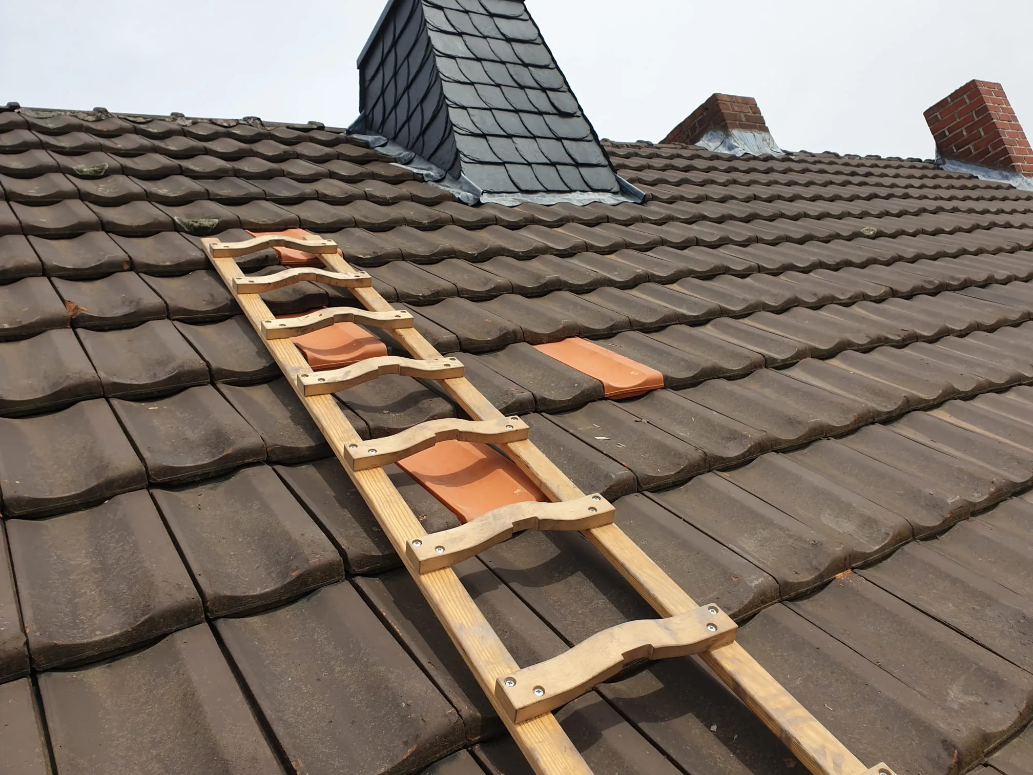 Dachreparatur mit Schiefergaube